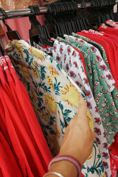 Person Shopping Colorful Patterned Fabrics Store