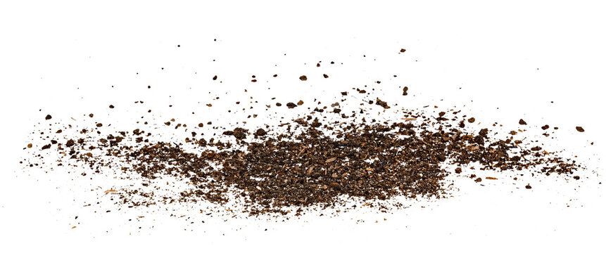 Scattered dark brown fertile garden soil dirt texture isolated on transparent background