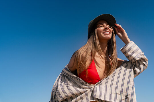 Smiling Person in Sun Hat