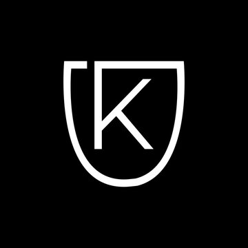black and white letter K and shield