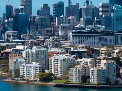 Sydney, Australia - 07 September 2026: Aerial view of the Sydney CBD skyline featuring dense waterfront apartments, modern mixed-use developments, and urban architecture along the harbor.