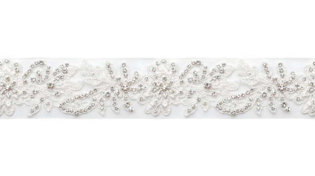 Elegant white lace trim with sparkling rhinestones isolated on transparent background