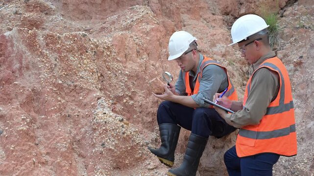Construction workers discussing site inspection results
