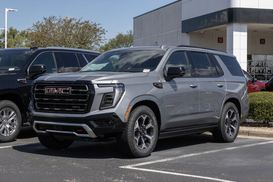 GMC Yukon 4WD AT4 Ultimate Large SUV at a dealership. GMC offers the Yukon with a 6.2L Ecotec3 V8 engine. MY:2026