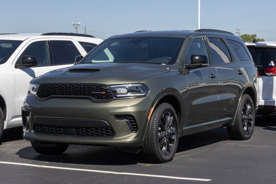 Dodge Durango GT Blacktop AWD 3-Row SUV at a dealership. Dodge offers the Durango with a 3.6L V6 Pentastar engine. MY:2026