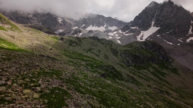 Forward aerial movement over rocky alpine landscape