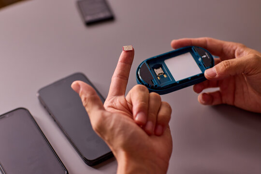 portable 4g usb modem without SIM card lies on the keyboard Stock Photo