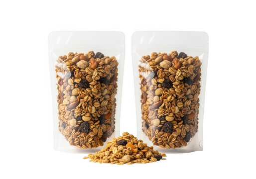 Two clear plastic bags filled with crunchy granola mix isolated on transparent background