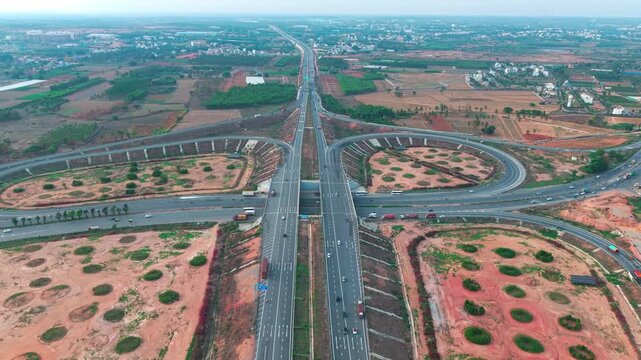  Aerial view of the new Bengaluru-Chennai Expressway cloverleaf interchange near Hoskote, India.
