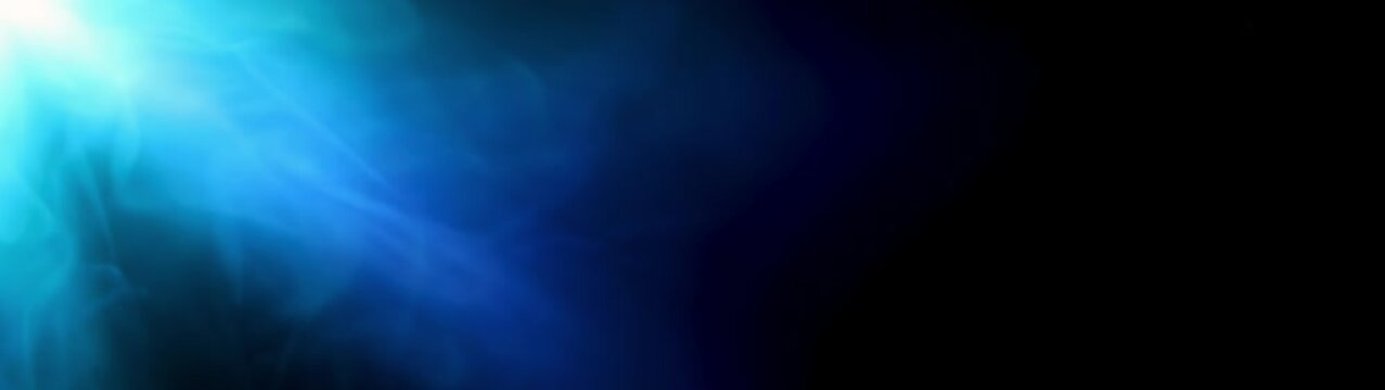 Blue light beam with subtle lens flares creating a luminous glow on a deep, dark space offering an ethereal sensation.