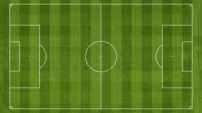 Aerial view of a soccer field with marked lines and lush green grass texture