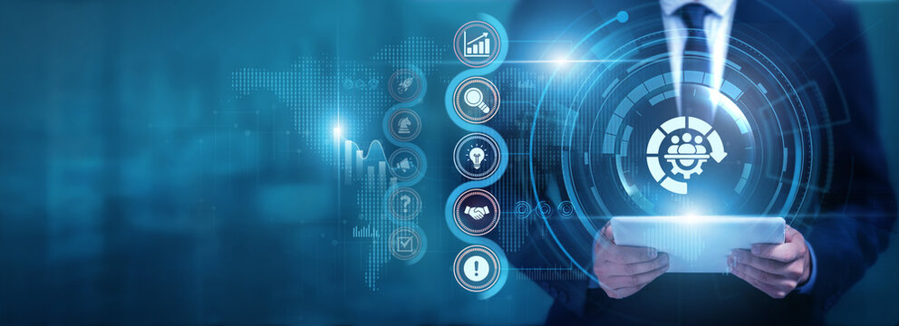 Businessman using tablet analyzing Project Management and performance data, monitoring task progress, optimizing workflows, improving team efficiency and supporting successful project delivery