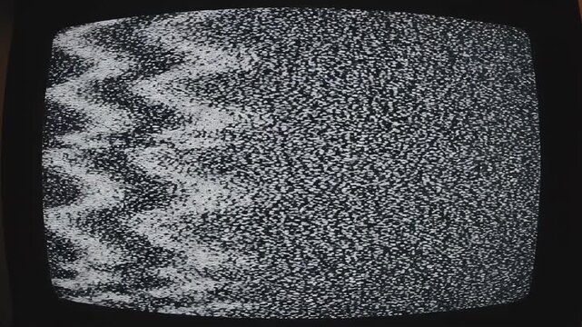 Retro television static test pattern in cinematic motion with subtle signal distortion