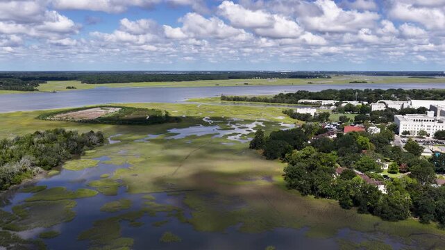 Aerial footage of a gorgeous landscape along the waterfront in Charleston South Carolina USA