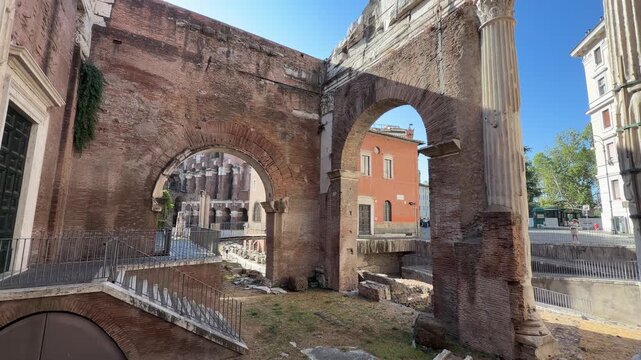 Vertical pan shot of Portico of Octavia ancient ruins in Rome