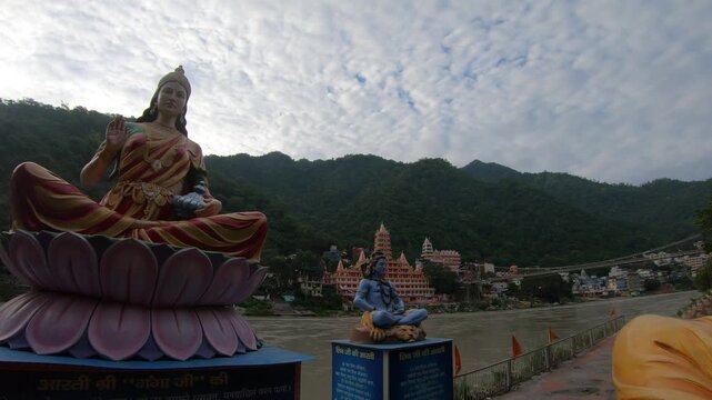 Rishikesh Ganga River and Lord Shiva Statue with Himalayan Hills, India &ndash; Time-Lapse