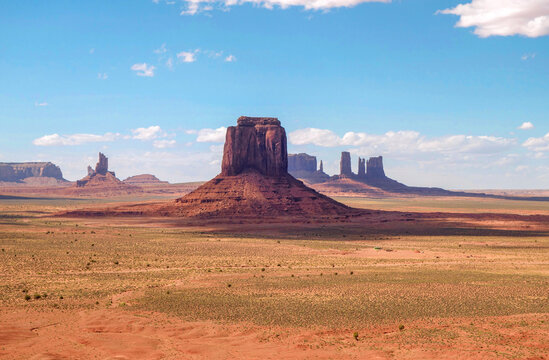 View of the spectacular red sandstone butte rock formations at Arizona's Monument Valley.