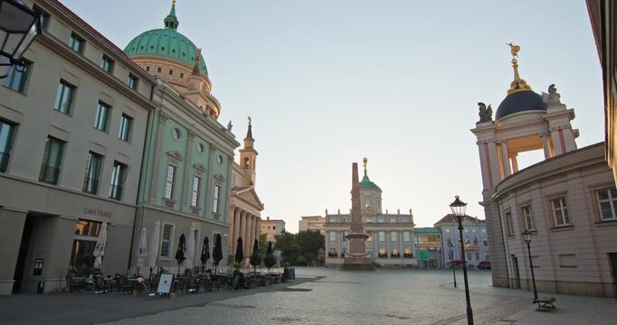 Alter Markt in Potsdam, Germany, with historic facades, St. Nicholas Church and the obelisk across the town square.