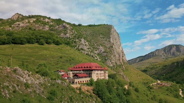 Aerial view of medieval castle nestled in the mountains, transylvania