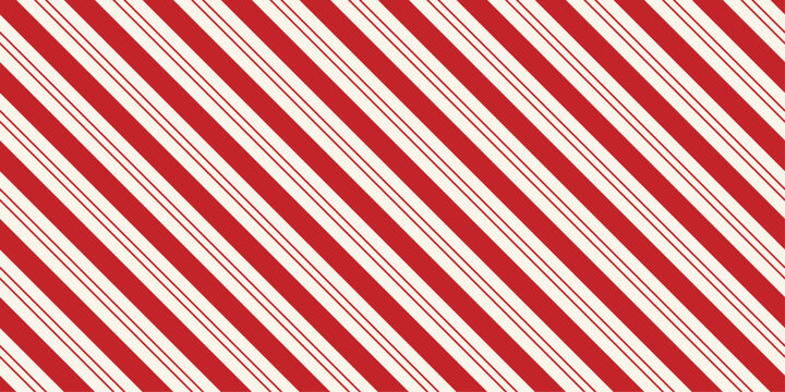 Red cream candy cane stripes form a seamless diagonal pattern