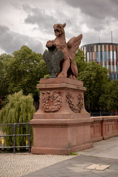 Berlin, Germany - July 4, 2026: Sandstone griffin sculptures decorate the historic Moltke Bridge near the Spree River in Berlin&rsquo;s government district.