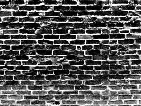 Weathered brick wall texture with aged mortar for vintage industrial design projects