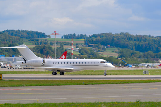 TAG Aviation Bombardier Global 6000 registration VP-CEW taxiing at Swiss Z&uuml;rich Airport on a summer day. Photo taken September 10th, 2026, Zurich Airport, Switzerland.