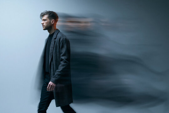 Man Walking with Motion Blur Effect Trailing Behind