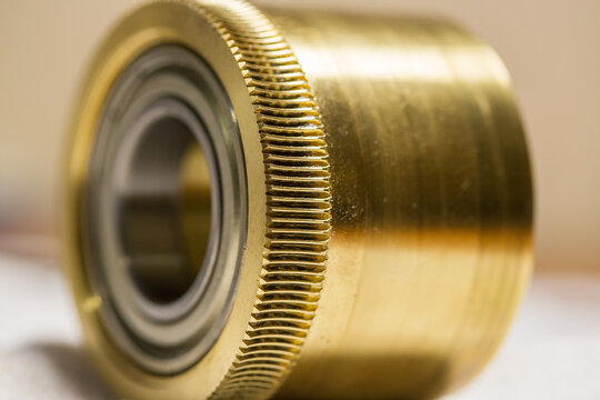 Bronze worm gear, close-up photo.