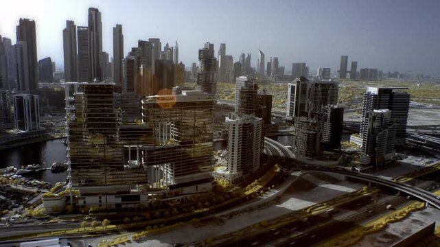 Infrared timelapse of the Dubai Marina skyline showing modern skyscrapers, waterways, and moving highway traffic under a clear sky