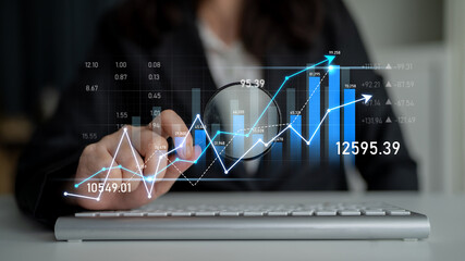 A professional examines financial data with a magnifying glass, highlighting trends and statistics...