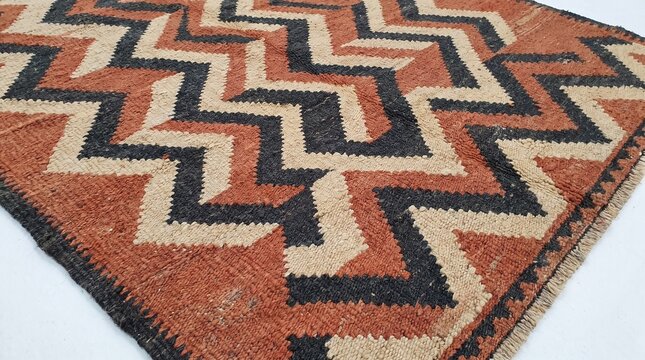 Traditional Berber Moroccan Wool Rug with Geometric Zigzag Chevron Pattern in Terracotta and Black