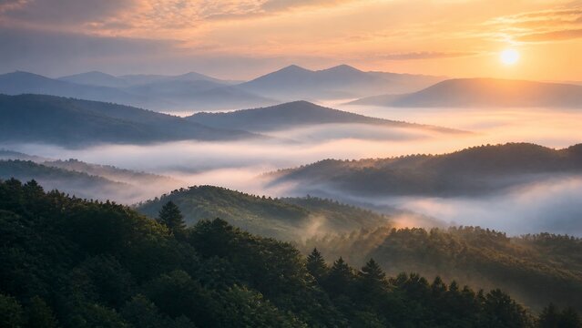 Misty mountain valley layers at sunrise
