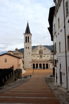 SPOLETO, ITALY - FEBRUARY 7, 2017: Duomo di Spoleto. Sitting at the bottom of a sloping square, Piazza del Duomo, the upper facade displays a golden mosaic of Christ from 1207, by artist Solsternus