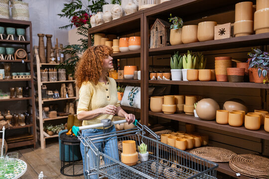 Woman shopping for home decor in garden center