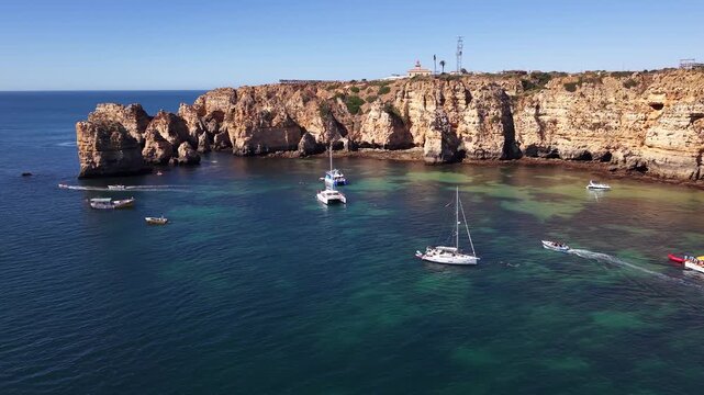 Sailing boats and yachts in ponta da piedade bay