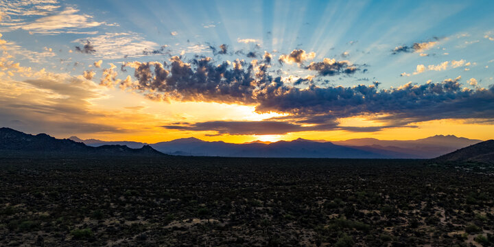 Ultra Wide Ratio Southwestern Desert Sunrise With Shooting Sun Rays