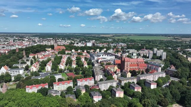 Stargard Poland city center church parks apartments slide pull 2. Northern Poland established in 8th century. Historical stronghold, defensive walls, gates and towers. Church, 15th century.
