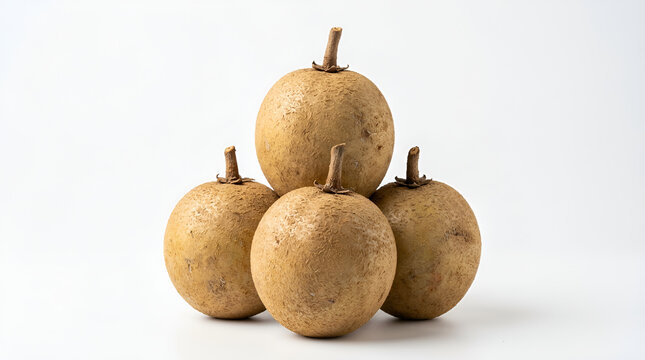 Four ripe round brown sapodilla fruits with rough fuzzy texture stacked pyramid with small dry stem on top, dull skin black spots, sweet tropical fruit, clean white minimalist background