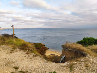 A serene, lonely clifftop overlook above the ocean, with nobody present. This peaceful landscape evokes solitude, natural beauty, and reflection, perfect for travel themes and quiet inspiration. © SolaruS