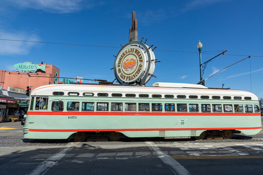 Historic PCC bus at the Fisherman's Wharf Sign in San Francisco.
