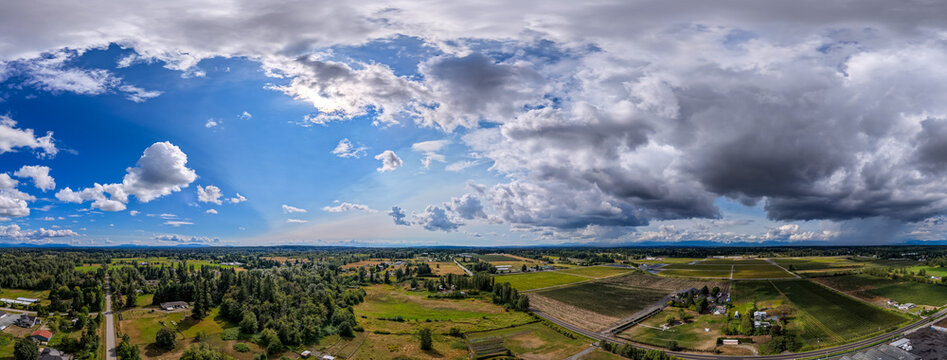 Aerial Panorama of Farmland and Dramatic Clouds Over Fraser Valley, British Columbia, Canada