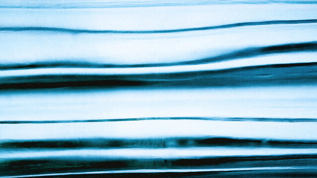 High-key abstract metallic surface with horizontal blue and whit