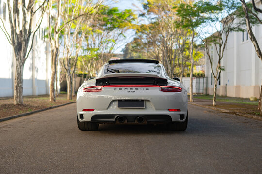 White Porsche 911 Carrera GTS Sports Coupe Rear View