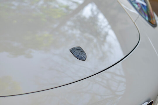 White Porsche 911 Carrera GTS Sports Car Front Hood Badge Emblem Close Up