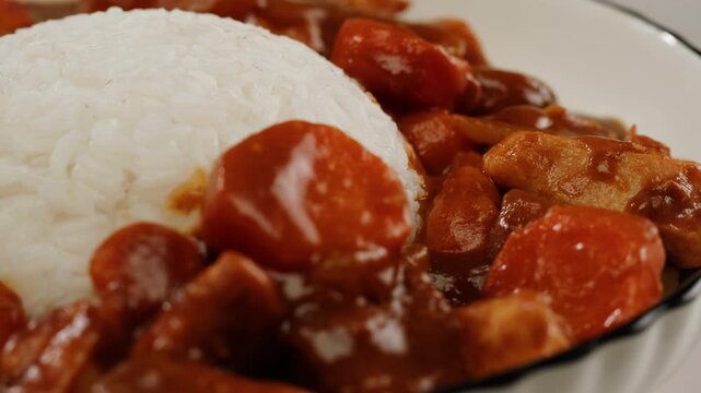 Japanese curry rice with fry pork Tonkatsu, Katsu Kare, Japanese breaded cooking dinner in restaurant, close up macro of asian food. 