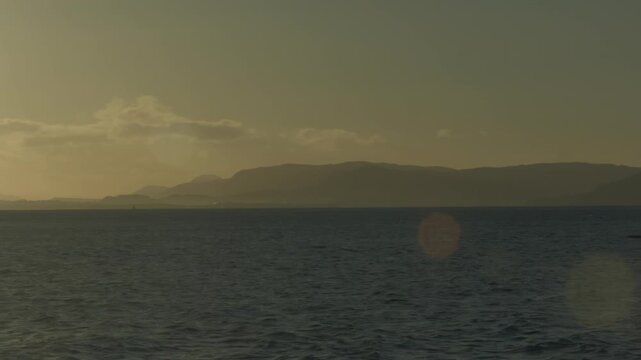 Wintertime timelapse overlooking the Moray Firth and the Kessock Bridge showing late afternoon winter atmosphere in a beautiful landscape.
