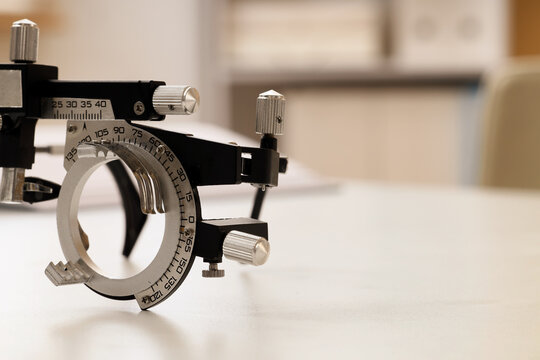 Eye examination and vision care, trial frame for optometry testing in a clinic for ophthalmology diagnosis and prescription of corrective lenses