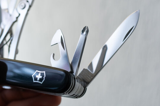 ZAPOPAN, MEXICO - SEPTEMBER 10, 2026: Extended steel tools of black Victorinox SwissChamp pocket knife.