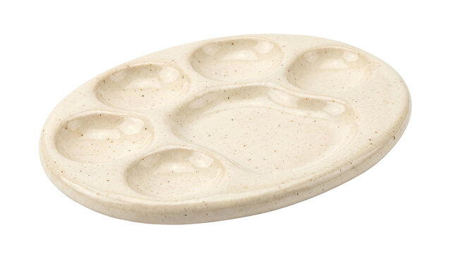 Cream speckled oval paint palette isolated on transparent background png
